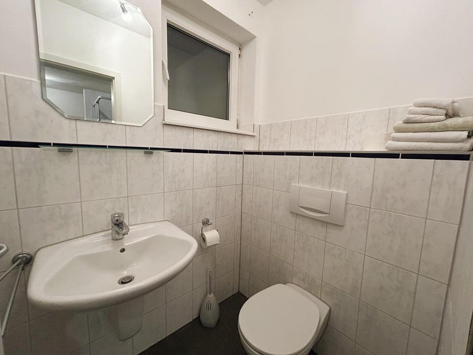 Zweifamilienhaus mit Gartenidylle in Spielstraßenlage – Bild 29