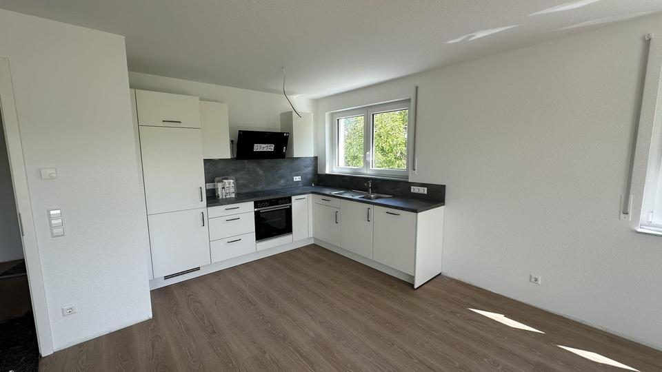 Moderne 3,5 Zimmer Erdgeschosswohnung in traumhafter Lage – Bild 2