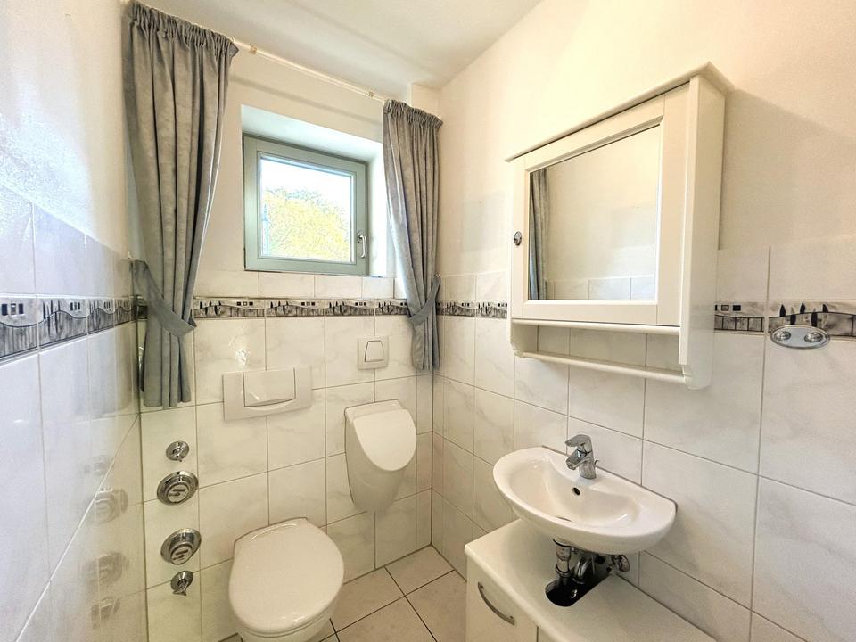 Zweifamilienhaus mit Gartenidylle in Spielstraßenlage – Bild 17