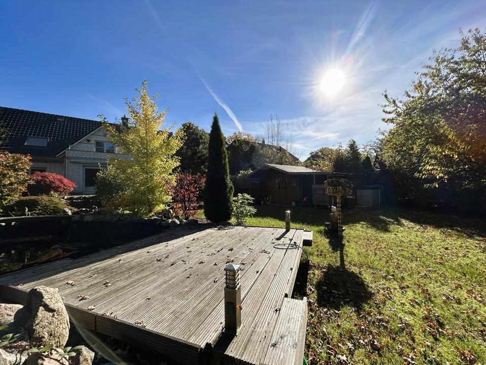 Zweifamilienhaus mit Gartenidylle in Spielstraßenlage – Bild 6