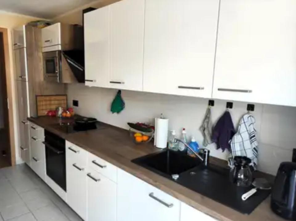 Moderne 2,5-Zimmer-Wohnung mit Einbauküche, Dachterrasse & TG-Stellplatz – Bild 9