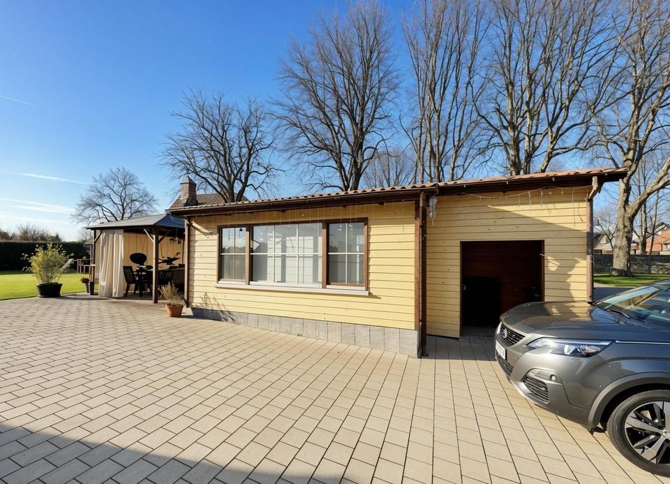 Attraktives Mehrfamilienhaus mit 4 Wohneinheiten auf großem Grundstück – Bild 6