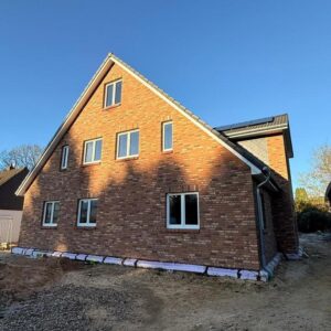 Wohnung mit Haus-Charakter: Energie Effizienter Neubau mit Garten