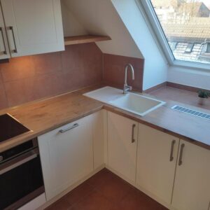 2-Zimmer-Wohnung mit Dachterrasse, EBK, saniertem Bad und TG im beliebten Österreichviertel